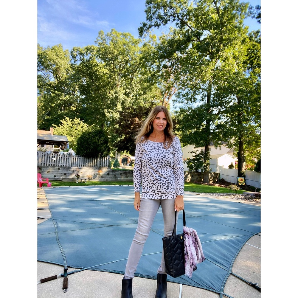 Leopard print off the shoulder top can be worn up or off one shoulder or both